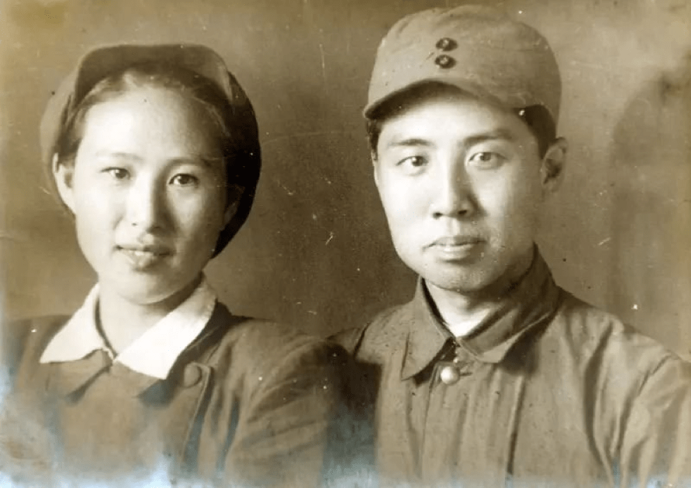 photograph of a man and woman posing together